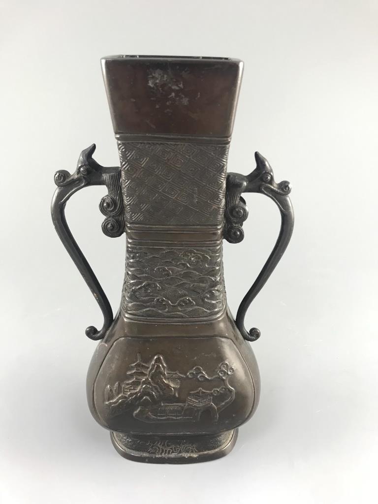 A Chinese bronze two handled flower vase, Ming dynasty, 24.5cm